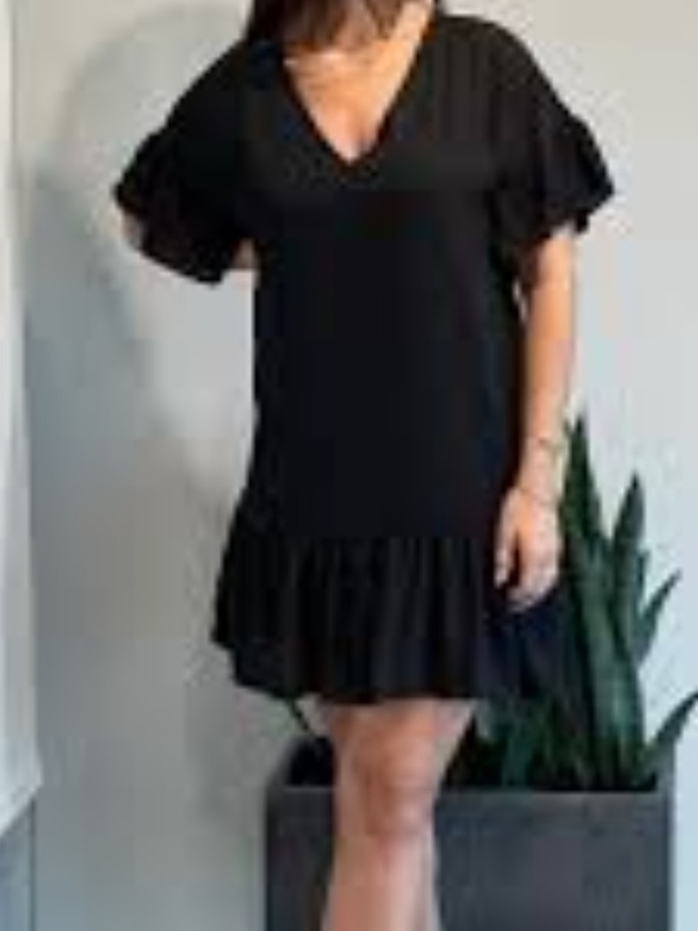 Tyche Black V-Neck Ruffle-Hem Mini Dress